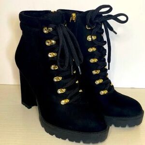 Jennifer Lopez Black Platform Boots with Gold Details